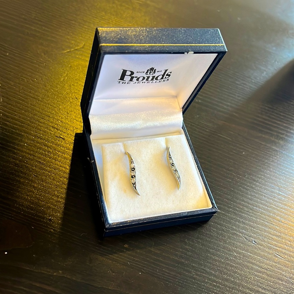 Silver earrings with cubic zirconia and onyx inlays